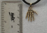 Load image into Gallery viewer, Skeletal Hands Leather Thong Necklace and Earring Set - Tully Crafts
